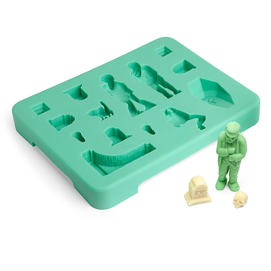 Zombie candy mold toppers on cake