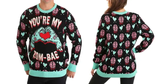 Zom-bae sweater: an ugly sweater style sweater with zombie hands making a heart shape and text reading "You're my zom-bae"