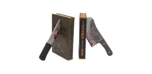 An imaging of zombie bookends. A bloody machete pieces the left one and a blood spattered meat cleaver punctures the right bookend.