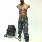 Michonne's pet zombie figure review Threezero green pet front view