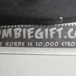 Closeup of zombiegift.com etched zombie killer machete