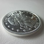 Photo obverse Zombucks The Barber silver round review