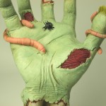 Closeup of Zombie Hand statue from Summit Collection